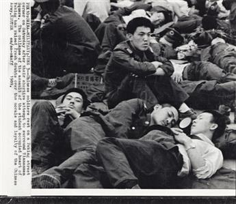 (CHINA) A group of 30 press photographs documenting the bloody culmination of the Tiananmen Square demonstrations in Beijing.